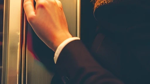 woman&#39;hand touching the elevator wall