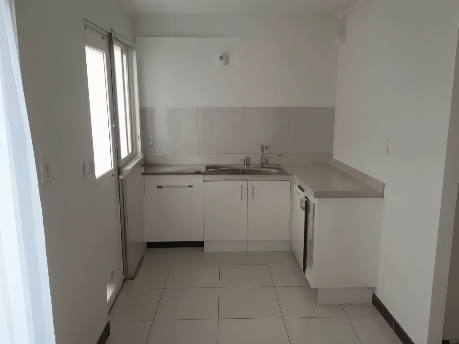 Creea una cocina moderna en esta imagen con cubierta marmol negro