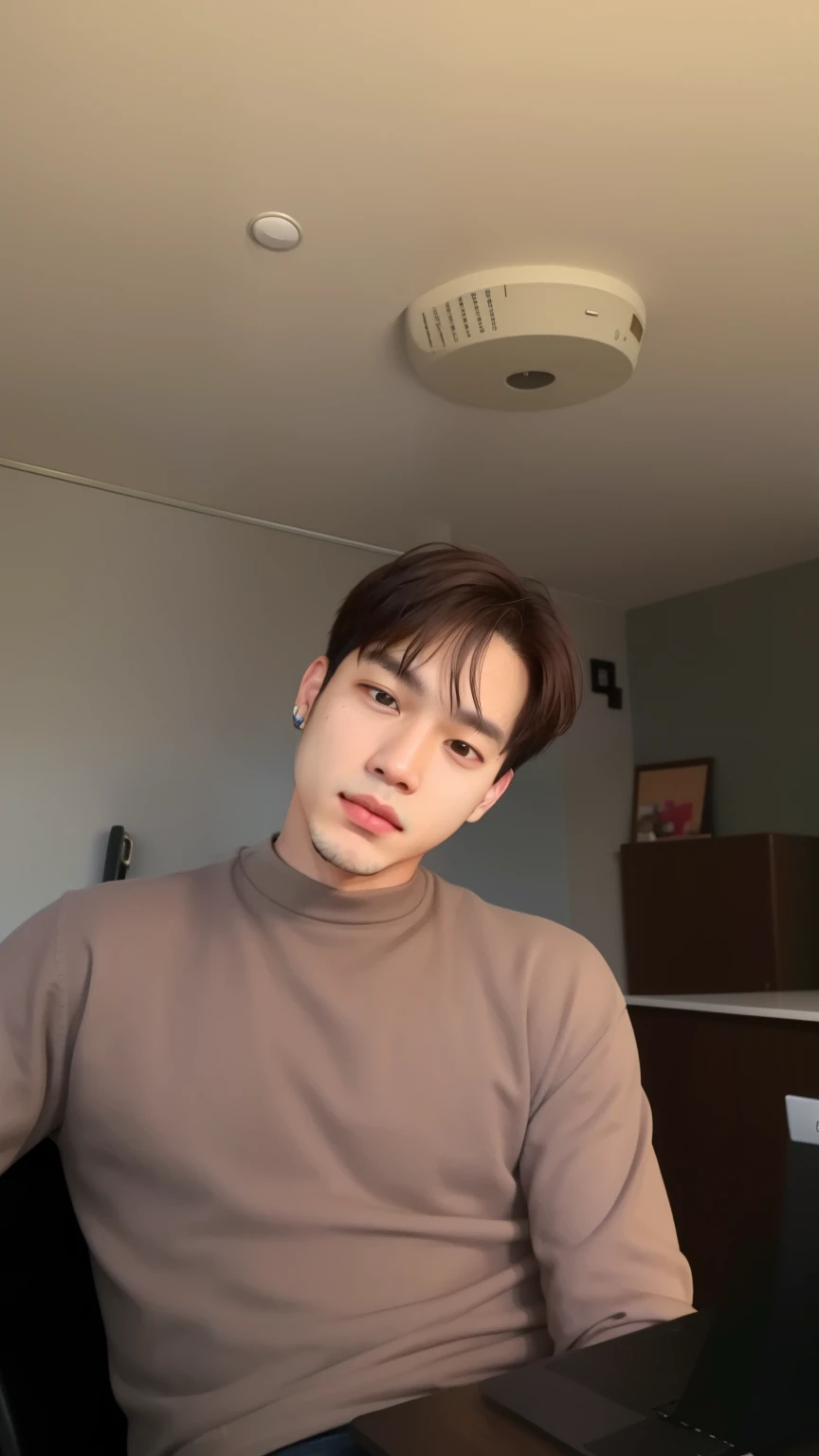 there is a man sitting in a chair with a laptop, Jimin\the full lips, Jimin\the right eyelid is swollen, accurate Jimin face, he is wearing a brown sweater, Jimin, homem sul-coreano, park Jimin, Jimin\o nariz grego, adorable and pale korean face, Jungkook, short hair on top of the head, com cabelo curto