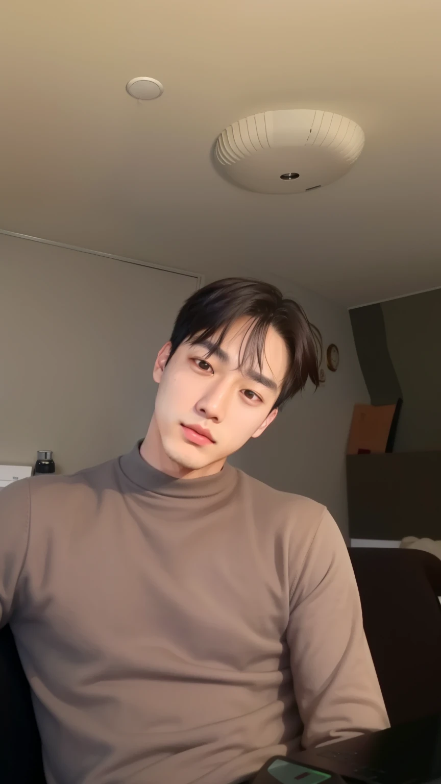 there is a man sitting in a chair with a laptop, homem sul-coreano, he is wearing a brown sweater, adorable and pale korean face, Jimin\the right eyelid is swollen, young lovely korean face, short hair on top of the head, he has an elongated head shape, inspirado em jeonseok lee, musculoso coreano de 2 a 1 anos, Jungkook