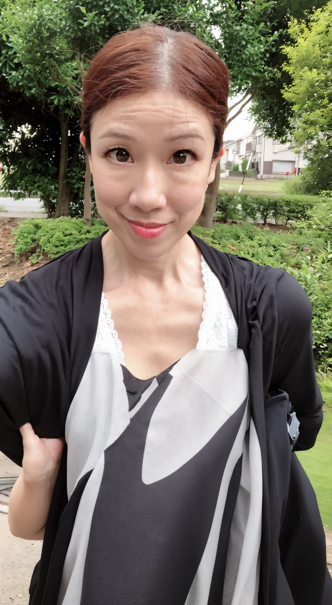There is a woman taking a selfie in the park., (38 years old), 30 year old female, 30 year old female, 38 years old, 3 , 32 years old, 40 year old female, 35 years old, 3 5 years oldld, about 3 5 years old