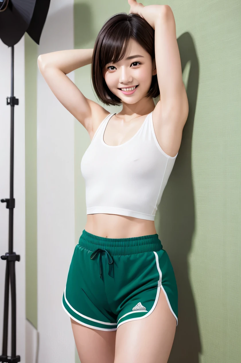 masterpiece, (Japanese girl:1.3), 18 years old, Short hair, Amazing face and eyes, Looking at the camera, shinny skin, Smile full of joy, show teeth, Show the armpits, spread legs, (green sports shorts:1.2), (Best Quality:1.4), extremely detailed CG unified 8k wallpaper, Highly detailed, High-definition raw color photos, professional photography, Realistic full-body shots, Filming in the studio, Plain wallpaper, sexy portrait of girl,