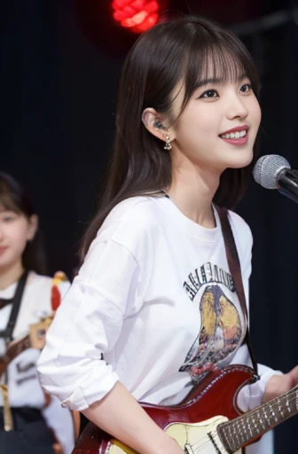 best quality, detailed, beautiful, insanely detailed, absurdres,perfect anatomy,
Japanese woman,black hair,27 years old,
(slender),
(small breasts),
laughing, bending over, bangs pinned back, (white jeans:1.1), (red t-shirt:1.1), earrings, (with a guitar, at concert:1.3), (gigantic scale:1.2), from front