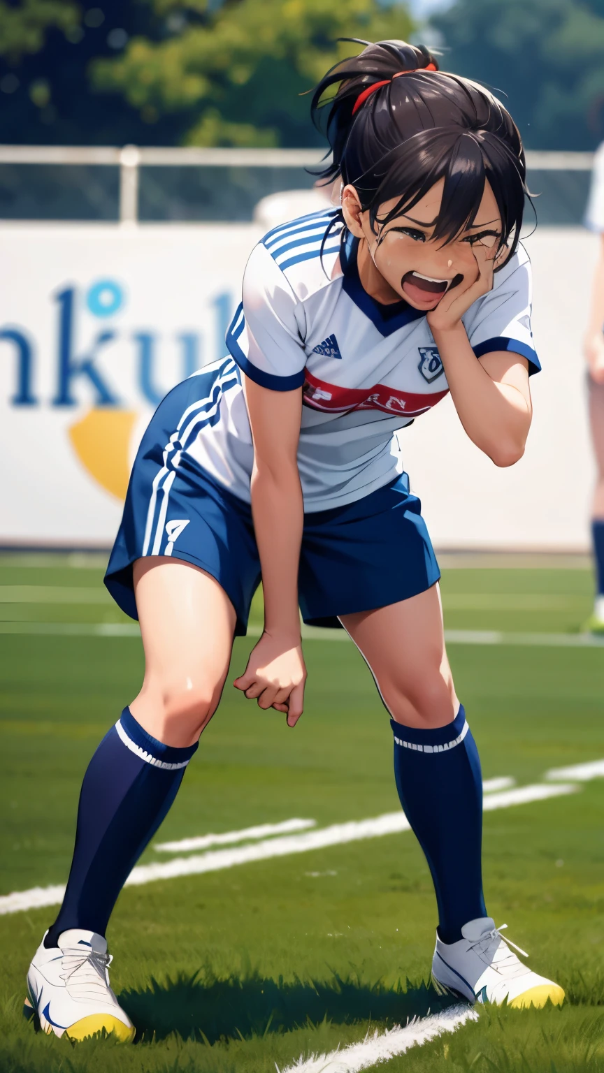 Female soccer player crying after losing a match