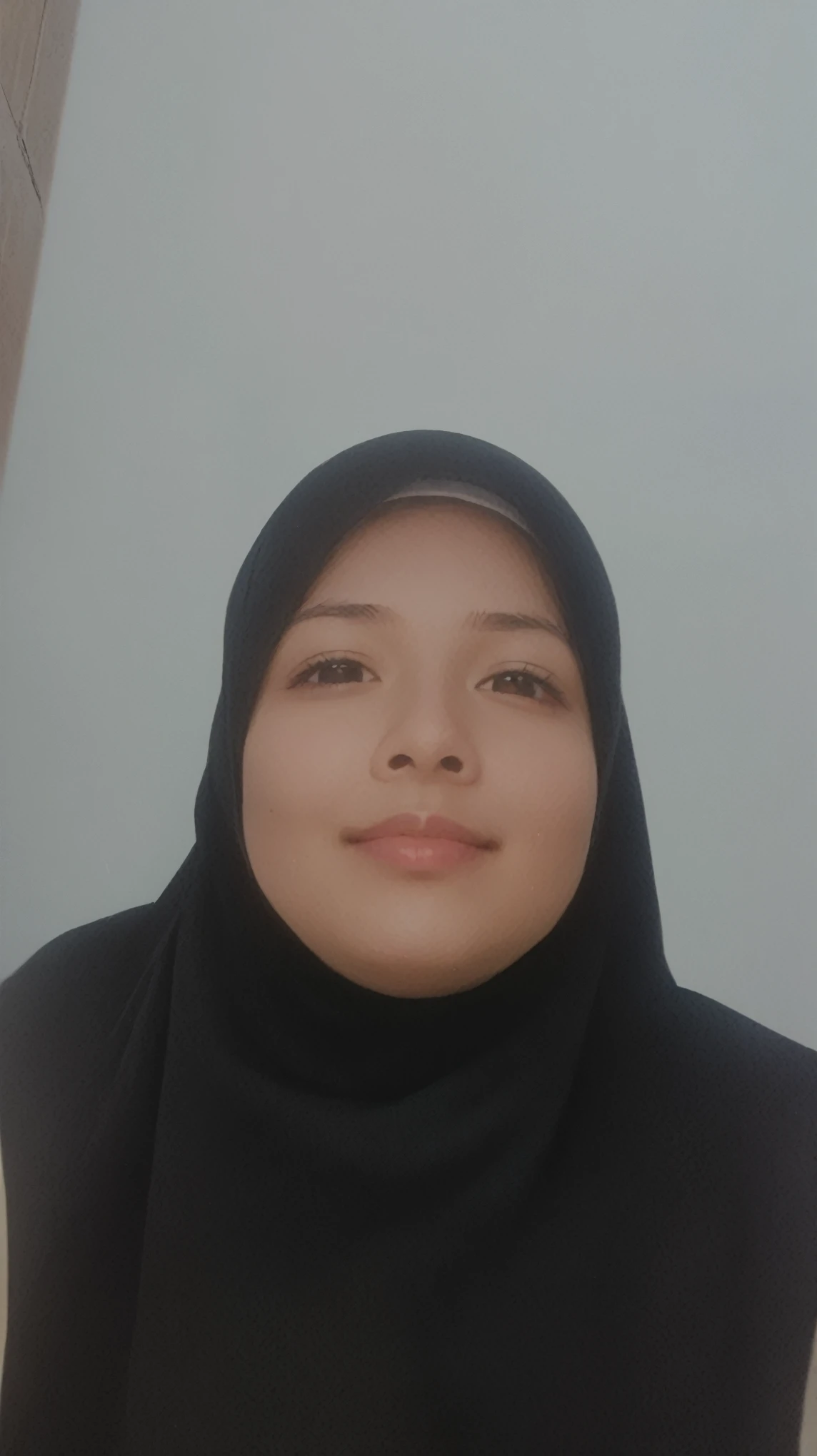 there is a woman wearing a black scarf and a black head scarf, faridah malik, protrait, hijab, old picture, picture, face picture, potrait, full protrait, selfie photo, student, a picture, profile picture 1024px, hannah yata, riyahd cassiem, close up potrait, 2 7