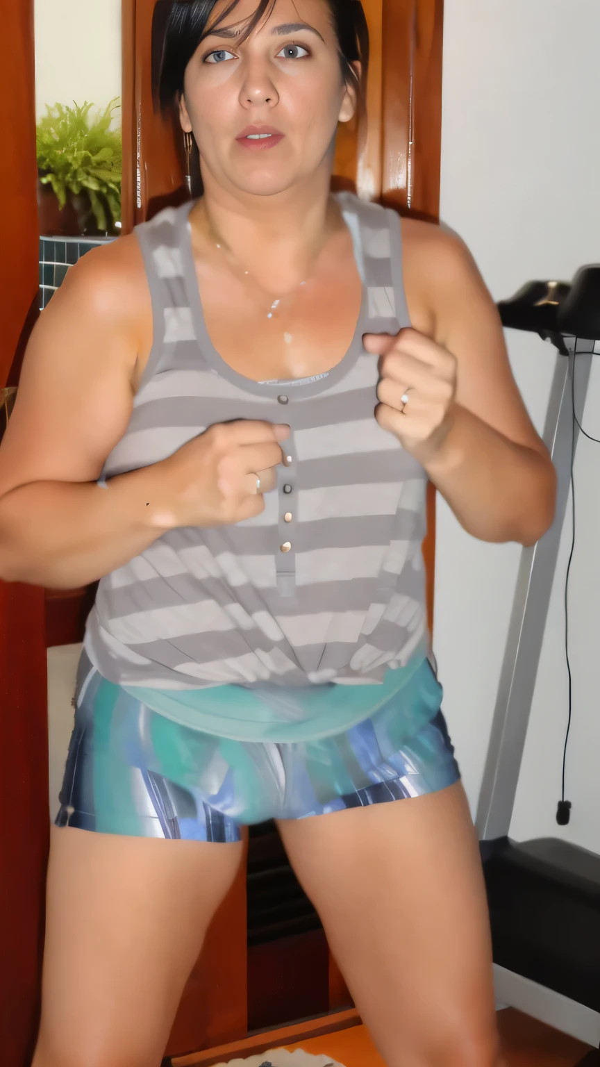 mulher com blusa listrada cinza e short azul em frente a um espelho, Wearing a regata, Wearing a regata and shorts, wearing a regata, regata, sports bra and shorts, dressed in a regata and shorts, wearing a low-cut regata Woman in good physical shape. Uma mulher com pele branca e cabelos escuros. ela tem cerca de 35 anos. Her slightly plump red lips are like a delicate flower, seus olhos castanhos escuros parecem conter um mundo de maravilhas. Corpo fino. cintura fina. Your body exudes glamor and your face is the definition of beauty. altamente realista, AINDA, slightly full lips, batom cor de rosa, Sorriso, feeling of lightness and joy, Hiper-realismo, pele muito elaborada, olhar. mulher fitness. clear photo, alta qualidade, high resolution, obra de arte, 8k.