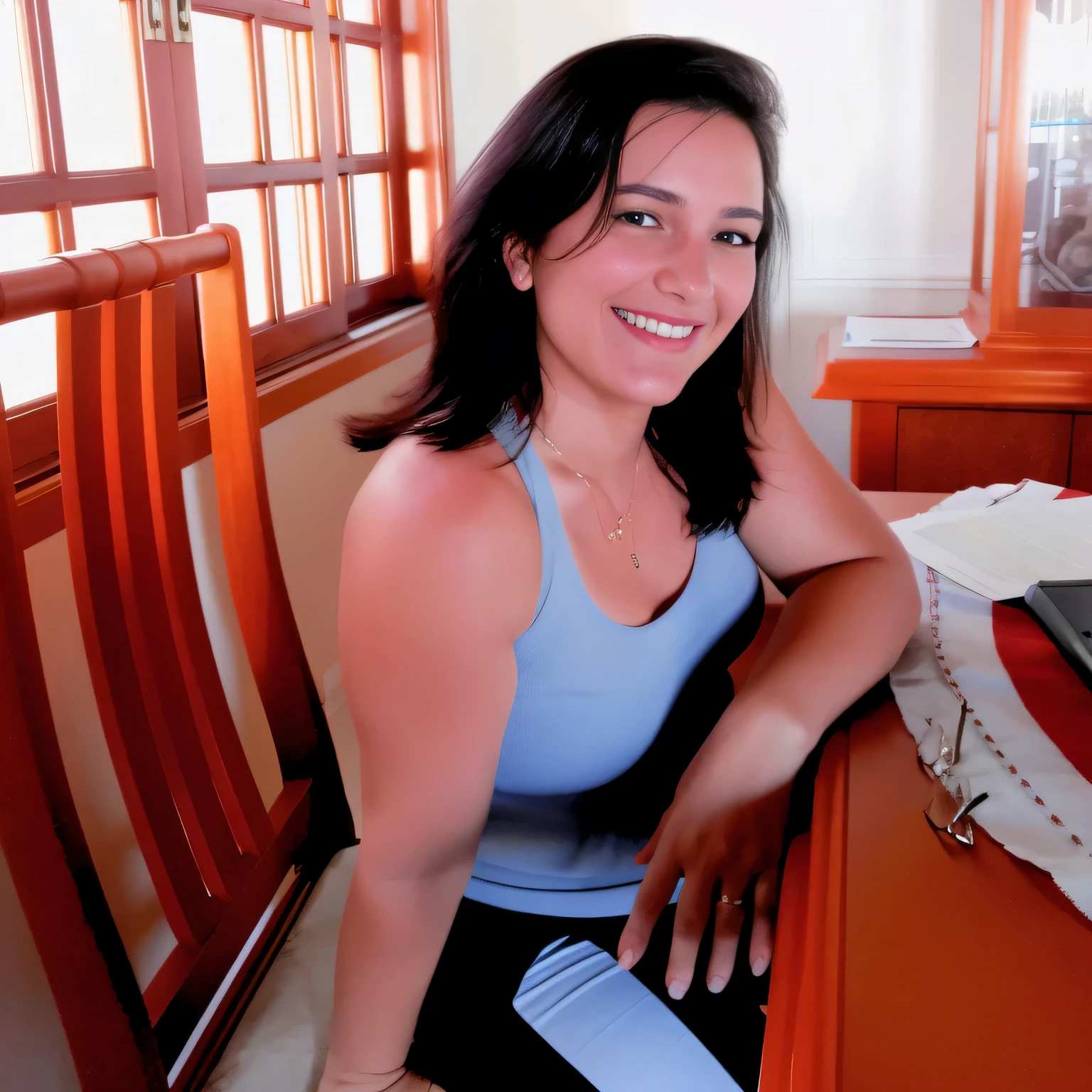 smiling woman sitting at the table with a laptop, 35 years old Brazilian. Woman in good physical shape. A woman with white skin and dark hair. She is about 35 years old. Her slightly plump red lips are like a delicate flower, her dark brown eyes seem to contain a world of wonders. Slim body. Thin waist. Her body exudes glamor and her face is the definition of beauty. Highly realistic, still, slightly full lips, pink lipstick, smile, feeling of lightness and joy, hyper-realism, very elaborate skin, look. Fitness woman. Sharp photo, high quality, high resolution, masterpiece, 8k.