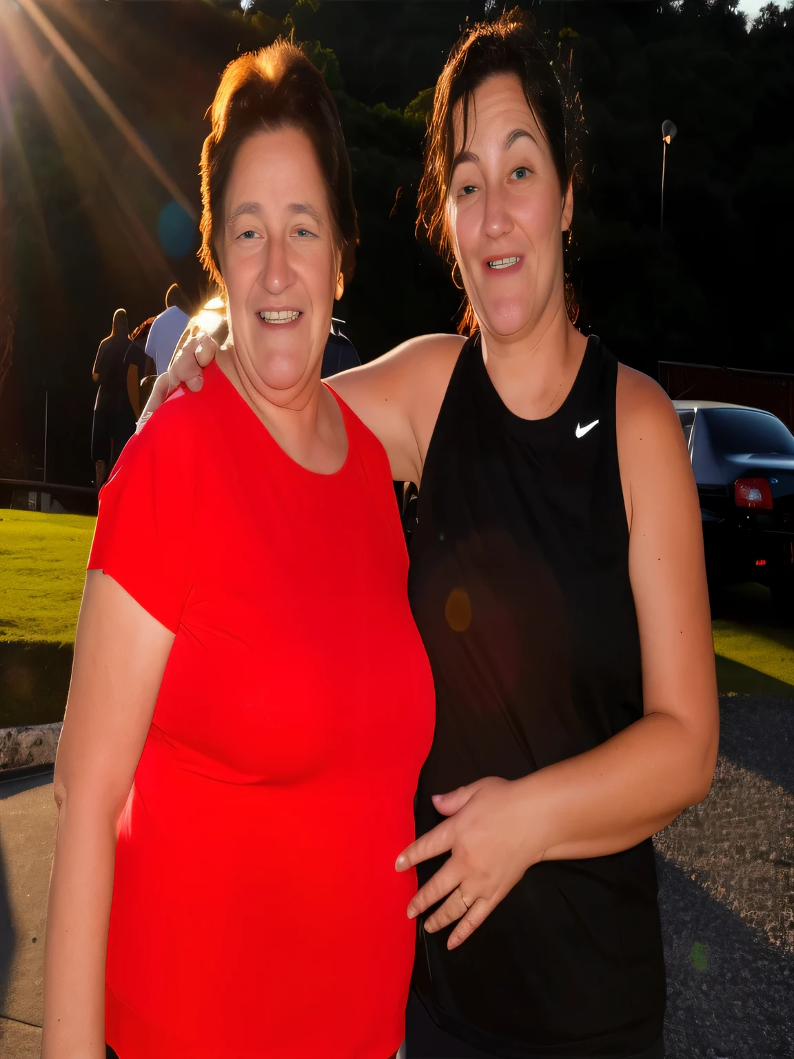 there are two women standing together in a parking lot, night time, at dusk!, malika favre, nighttime!, karla ortiz, at sunset, sunset!, camaraderie, pilar, late evening, photo taken at night, two women, sun down, sun setting, summer evening, evening sunlight, evening at dusk, beautiful surroundings