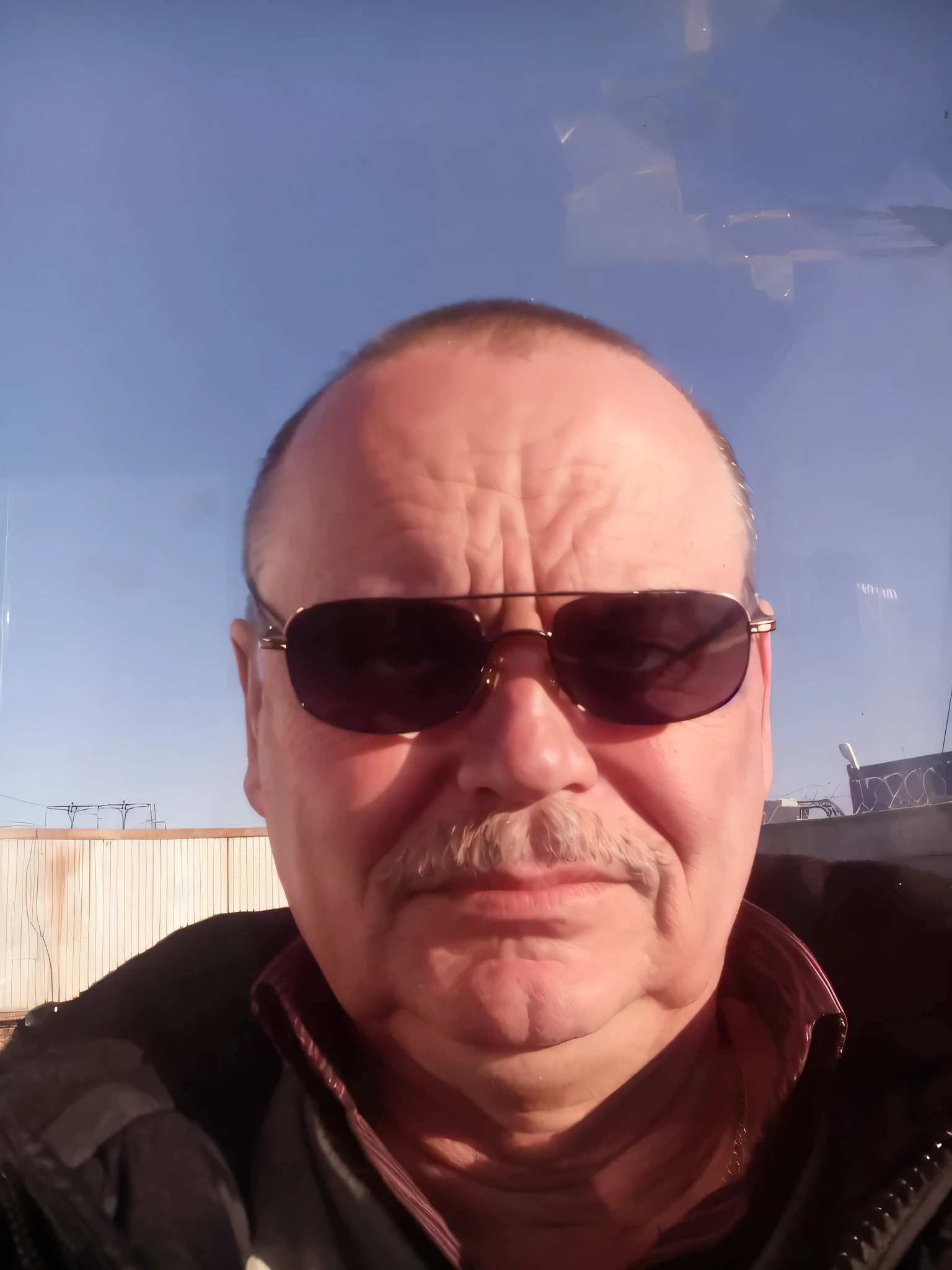 Arafed with sunglasses and mustache in the car, he is about 60 years old, He is about 50 years old, He is about 50 years old, he is about 60 years old, Encho Enchev, he is about 7 0 years old, photo of a 50 year old white man, 5 0 years old male