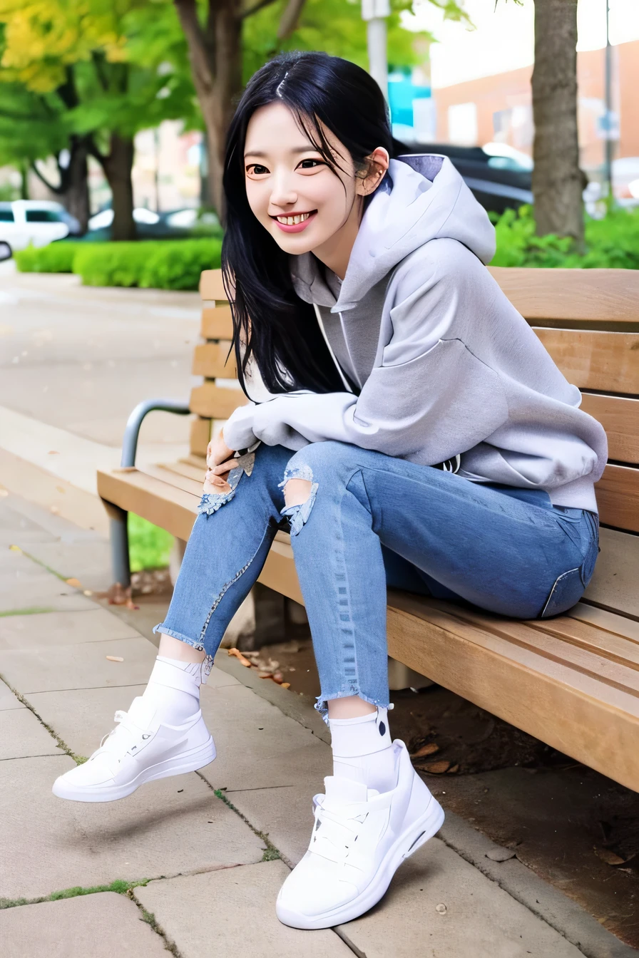 A neat and beautiful woman sitting on a park bench、black hair、hoodie、ear piercing、skinny denim、sneakers、wear socks、smile。、beautiful teeth、full body photo、
