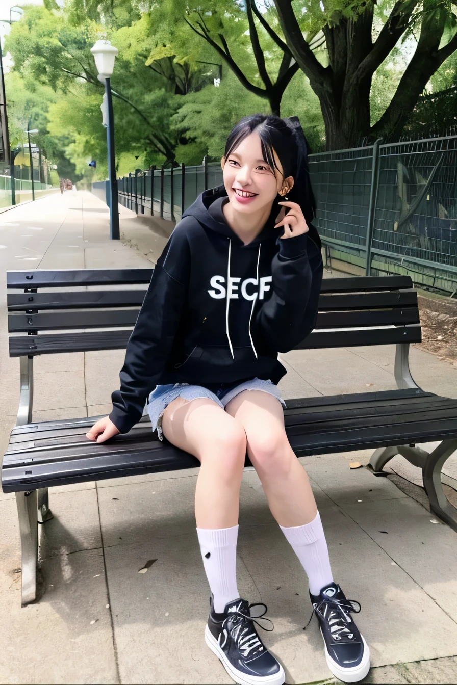 A neat and beautiful woman sitting on a park bench、black hair、hoodie、ear piercing、skinny denim、sneakers、wear black socks、smile。、beautiful teeth、full body photo