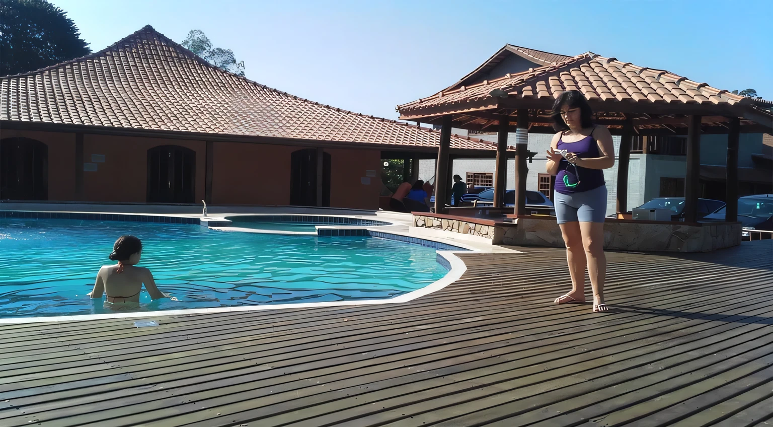 there is a woman standing next to a pool with a , swimmingpool, poolside, playing at swiming pool, swimming pool, pool, next to a pool, swimming, swimming pool in front, outside, go pro, malika favre, bottom angle, full body wide shot, next to a tropical pool, full - view, beautiful image, full pose.