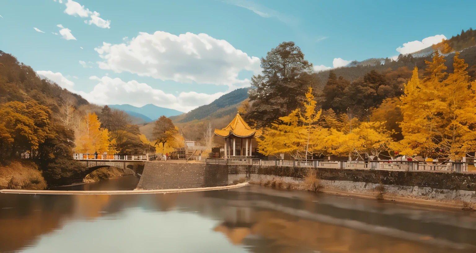 Blue sky and white clouds,The mountain is covered with golden ginkgo trees