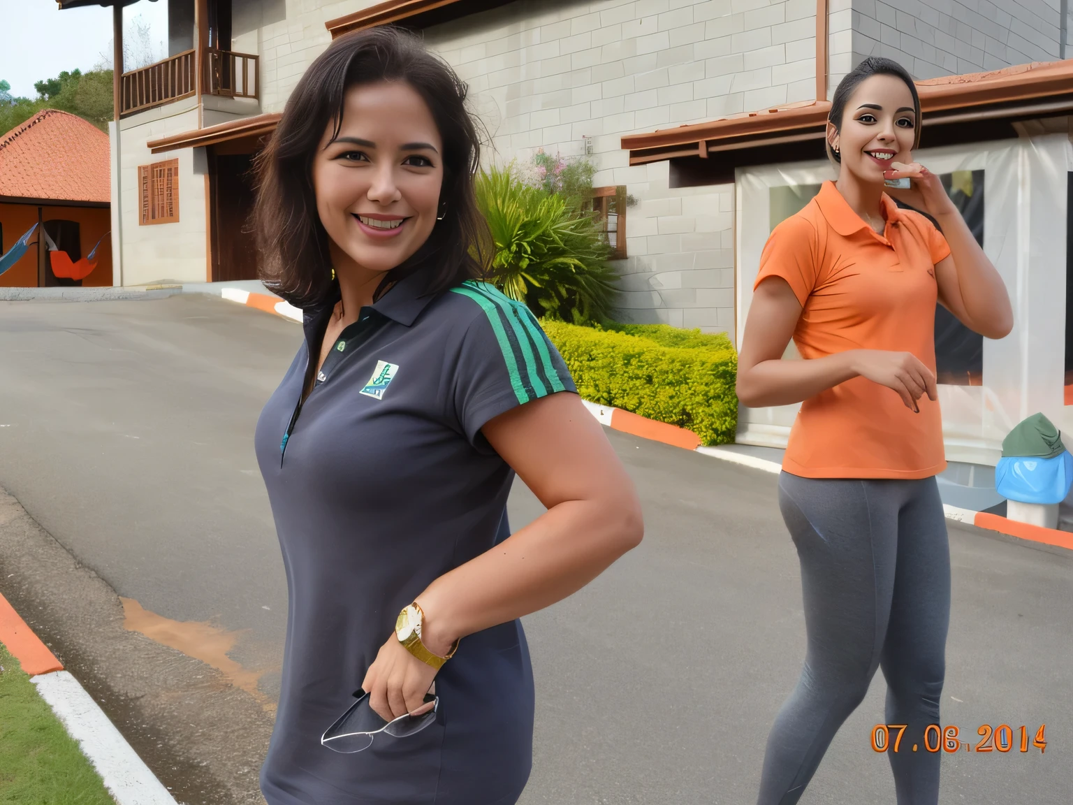 smiling woman in a gray and orange shirt in front of a building, beautiful surroundings, fit, adriana dxim. She is 155 cm tall and around 40 years old. A woman with tanned white skin and dark hair. She is around 40 years old. She has slightly full lips and dark brown eyes. Perfect body, slim body, slim waist. tanned skin, soft lips, red lipstick, a feeling of lightness and joy, hyperrealism, very elaborate skin. Fitness woman, fit woman, gym woman, woman in good physical shape, full body photo, clear photo, high quality, high resolution, masterpiece, 8K.