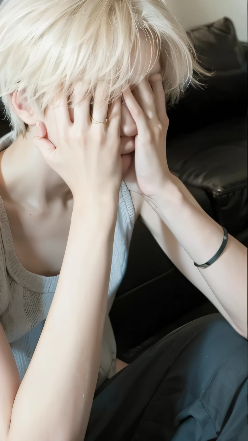 boy covering his face