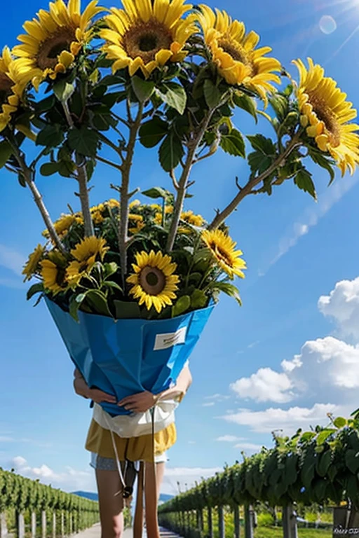 Un champ de tournesols ondulant au vent sous un ciel bleu profond