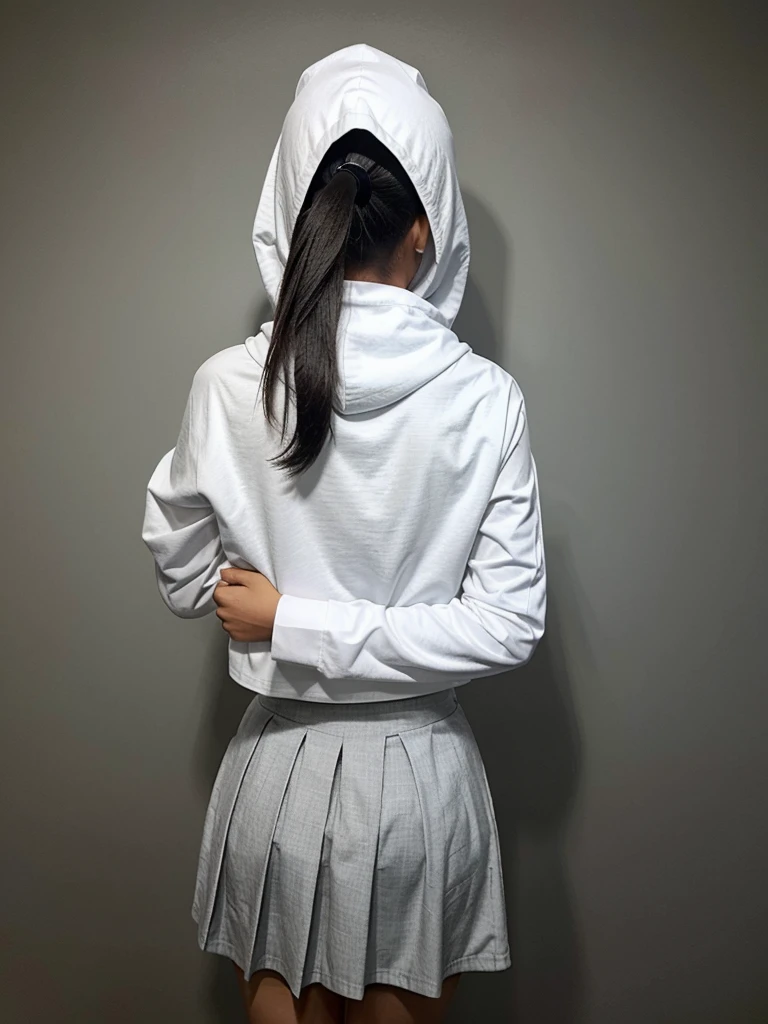 Indonesian , 15 year old, , hooded, long white sleeves, long gray skirt, back-to-back at school, won a national competition trophy in Indonesia.