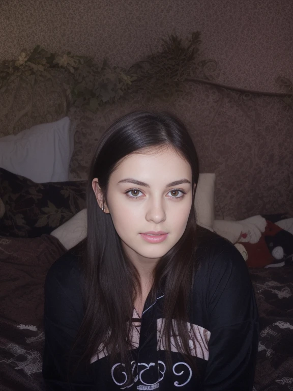 woman with dark hair posing in bed wearing cute pajamas
