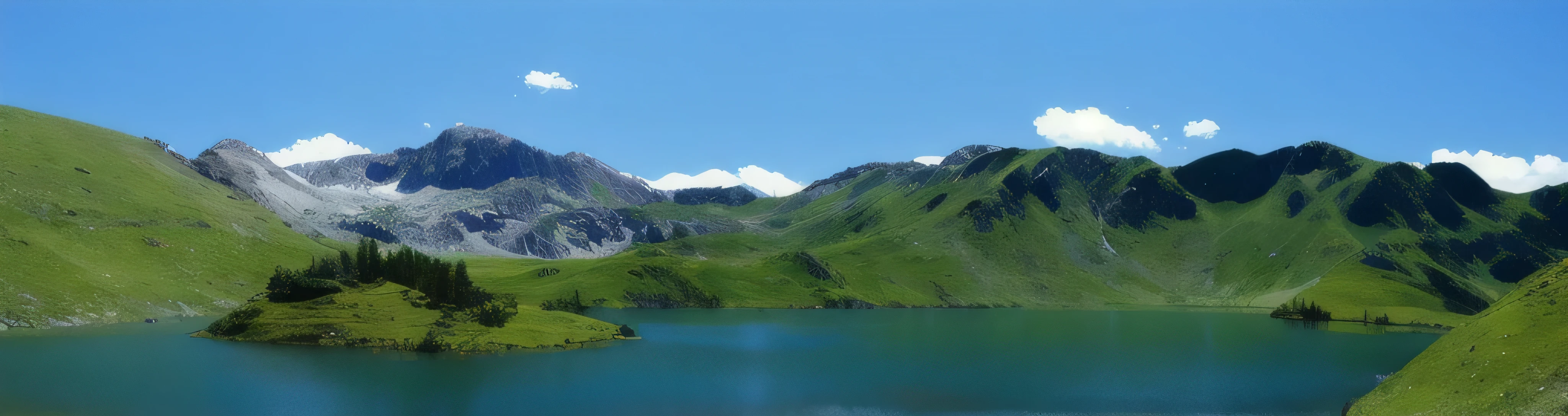there is a large body of water surrounded by mountains and grass, by Werner Andermatt, a lake between mountains, mountain lake, majestic nature scenery, beautiful image, beautiful lake, lakeside mountains, breathtaking scenery, serene environment, beautiful lake background, a photo of a lake on a sunny day, very very beautiful scenery, in a vast serene landscape, very very very beautiful scenery