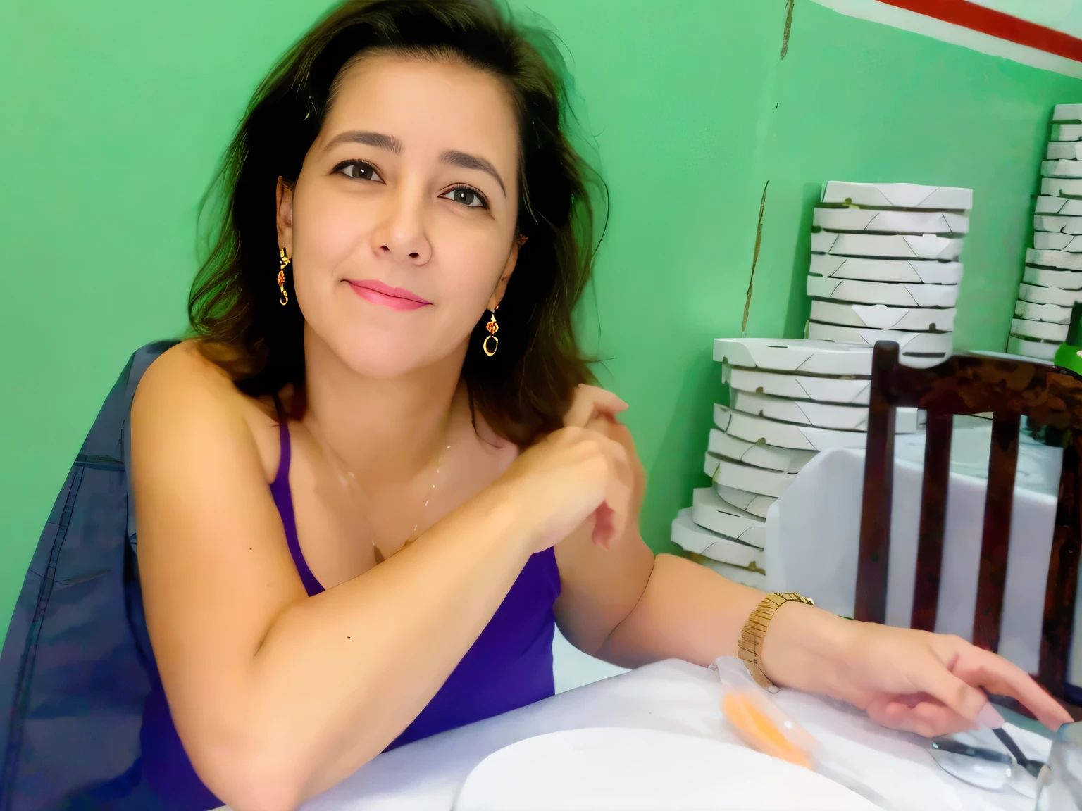 there is a woman sitting at a table with a plate of food, she looks like the Brazilian teacher Cláudia Regina Martins, high quality, high resolution, 8k.
