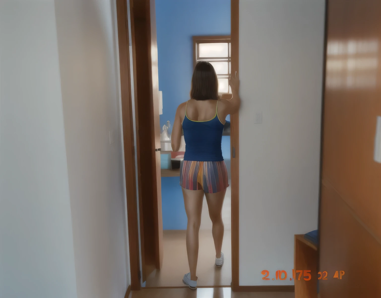 there is a woman standing in a doorway looking at something, wearing a blue tank top, tight, tight, multicolored shorts, rear view, back view, back view, back view!!, back photo, distant full body view, photo on her back, 35-year-old Brazilian mother. Woman 1.65m tall, weighing 54 kilos, in good physical condition, in good shape, wearing: tank top, high quality, high resolution, 8k.