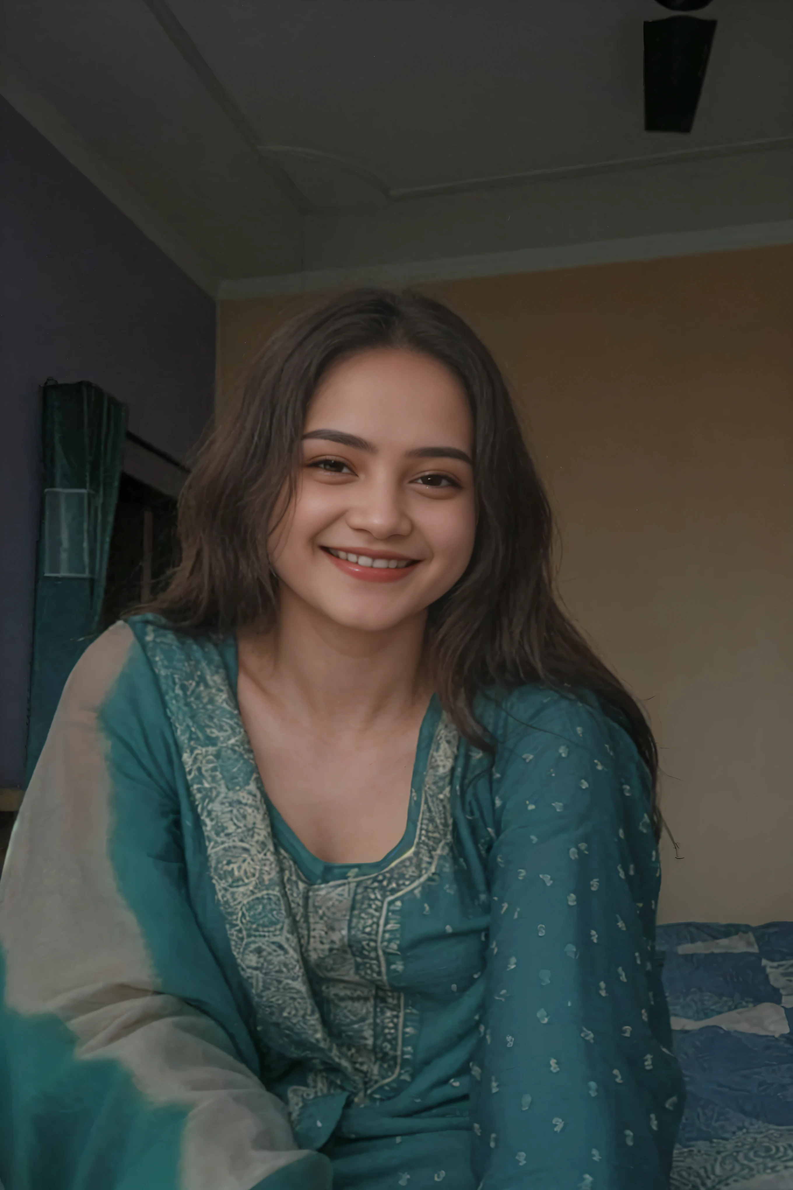 smiling woman in green dress sitting on bed with blue and white bedspread, with a beautifull smile, indian, she is smiling, lovely smile, beautiful and smiling, with a happy expression, with a bright smile, she is smiling and happy, happily smiling at the camera, slight cute smile, very very low quality picture, photo of a woman, smiling and looking directly