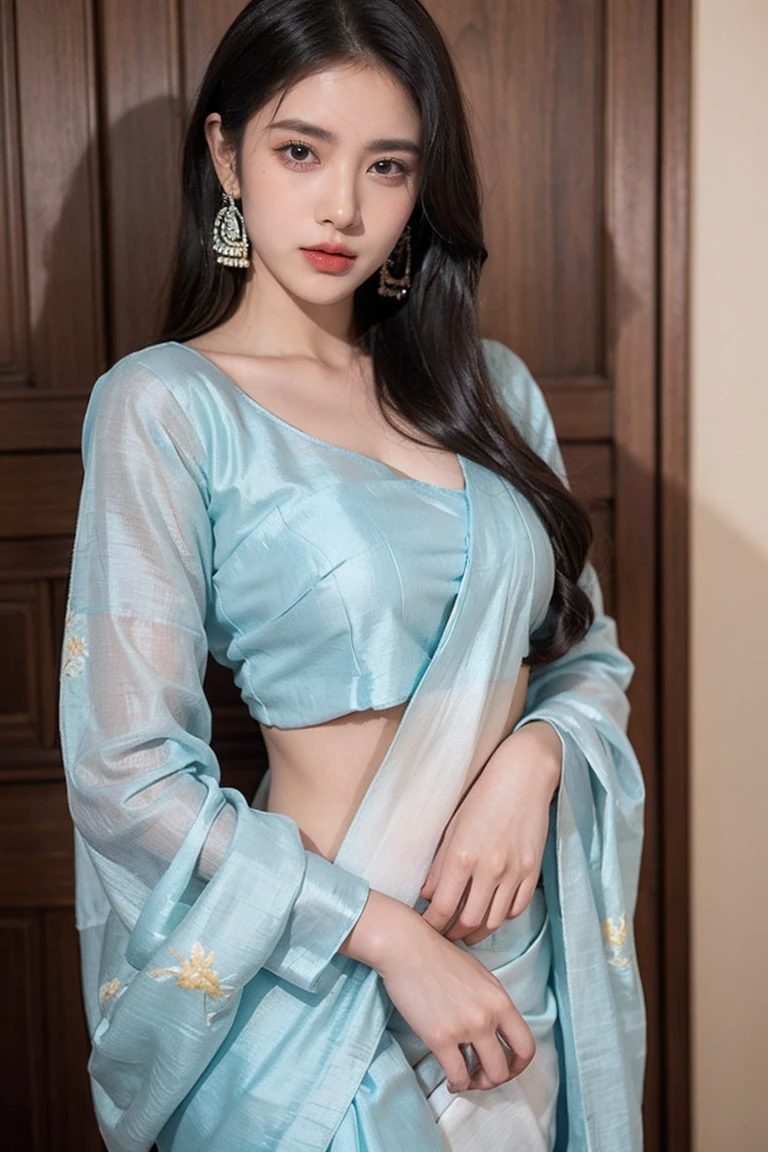 White tie-dyed silk saree with white, brown and aquamarine Nakshi Kantha embroidery. Comes with matching unstitched blouse piece attached at the end of saree. Blouse shown in the photo is a styling suggestion, it is not a part of the actual product.