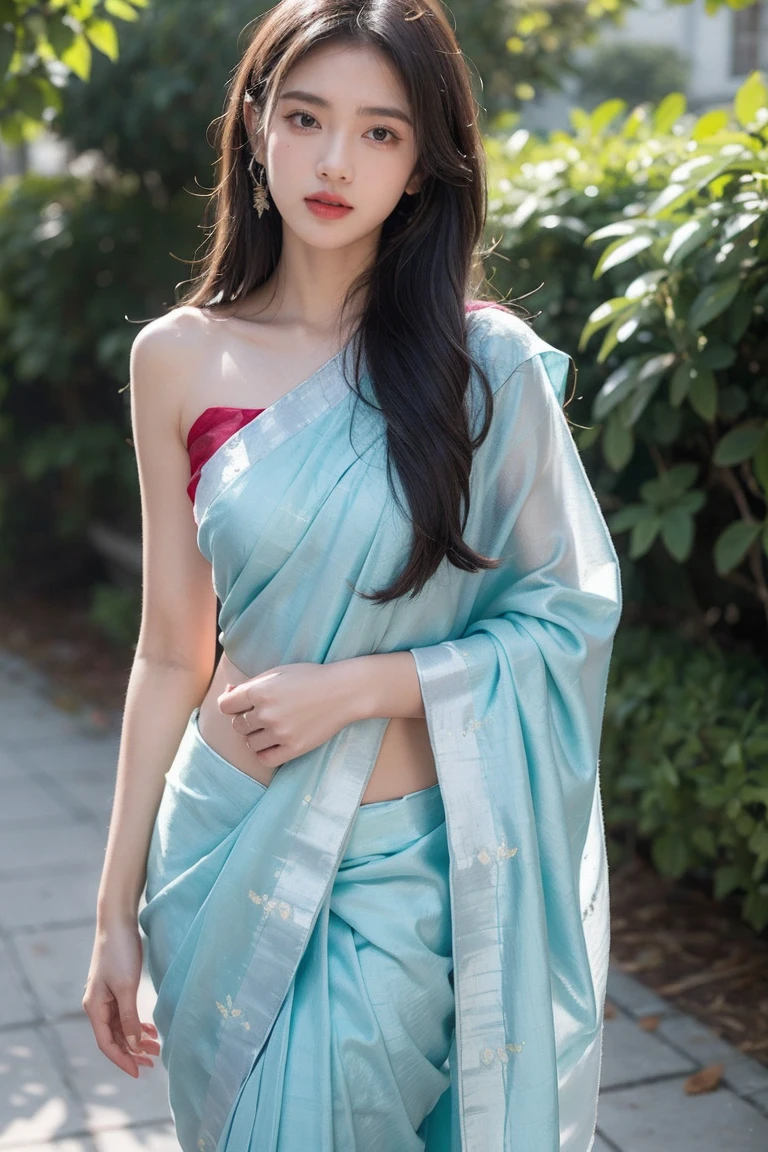 White tie-dyed silk saree with white, brown and aquamarine Nakshi Kantha embroidery. Comes with matching unstitched blouse piece attached at the end of saree. Blouse shown in the photo is a styling suggestion, it is not a part of the actual product.