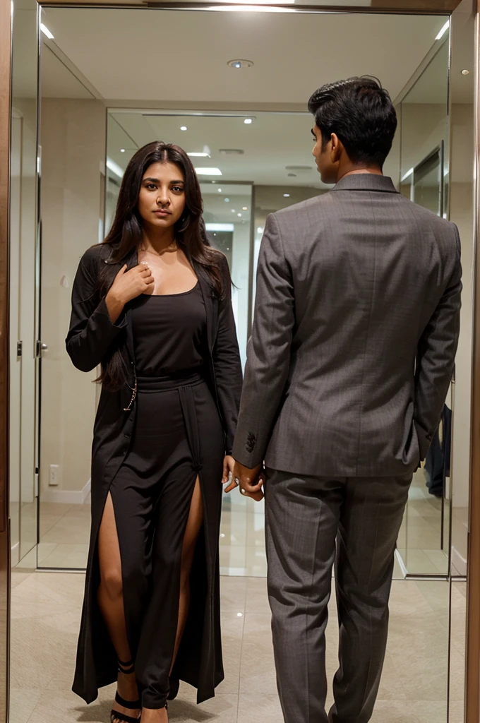  A couple of a 45 year old American woman wearing slit maxi with 20 year old Indian boy dark grey chocolate suit look together in mirror in romantic look 