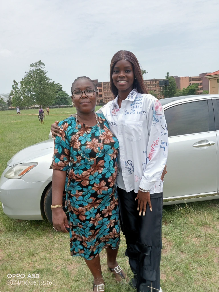 there are two women standing next to a car in a field, 2 0 2 2 photo, digital image, very very low quality picture, by Marshall Arisman, digital photograph, edited, group photo, commissioned, album photo, young lady, high quality picture, student, a picture, by Chinwe Chukwuogo-Roy, discovered photo
