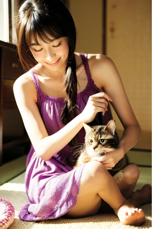 A super beautiful Japanese woman playing with a kitten