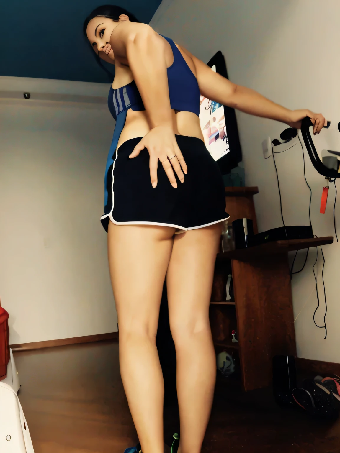 RAW, Best quality, high resolution, Masterpiece: 1.3, Beautiful brunette. Best quality, high resolution. Realistic, detailed, full-length woman in a blue top and black short shorts, very short woman in a blue top and black shorts is using an exercise bike, in shorts, legs and arms, long shot from back, sports bra and dark blue shorts, sports bra and shorts, shot from behind, working out, toned legs, thighs!!!!!!, A high resolution,(photographrealistic),Cute Girl,Sexy Pose, 8K, NFSW, A cute Brazilian woman, Smile, Underwear, opens legs,Tennis Uniforms, a miniskirt, Cowgirl, I'm sweating, Male genitals entering the crotch、fitness body, sports bra and dark blue shorts, toned legs. She is around 35 years old, a woman in good physical condition. Masterpiece, best quality, (best quality), realistic lighting, 8k.