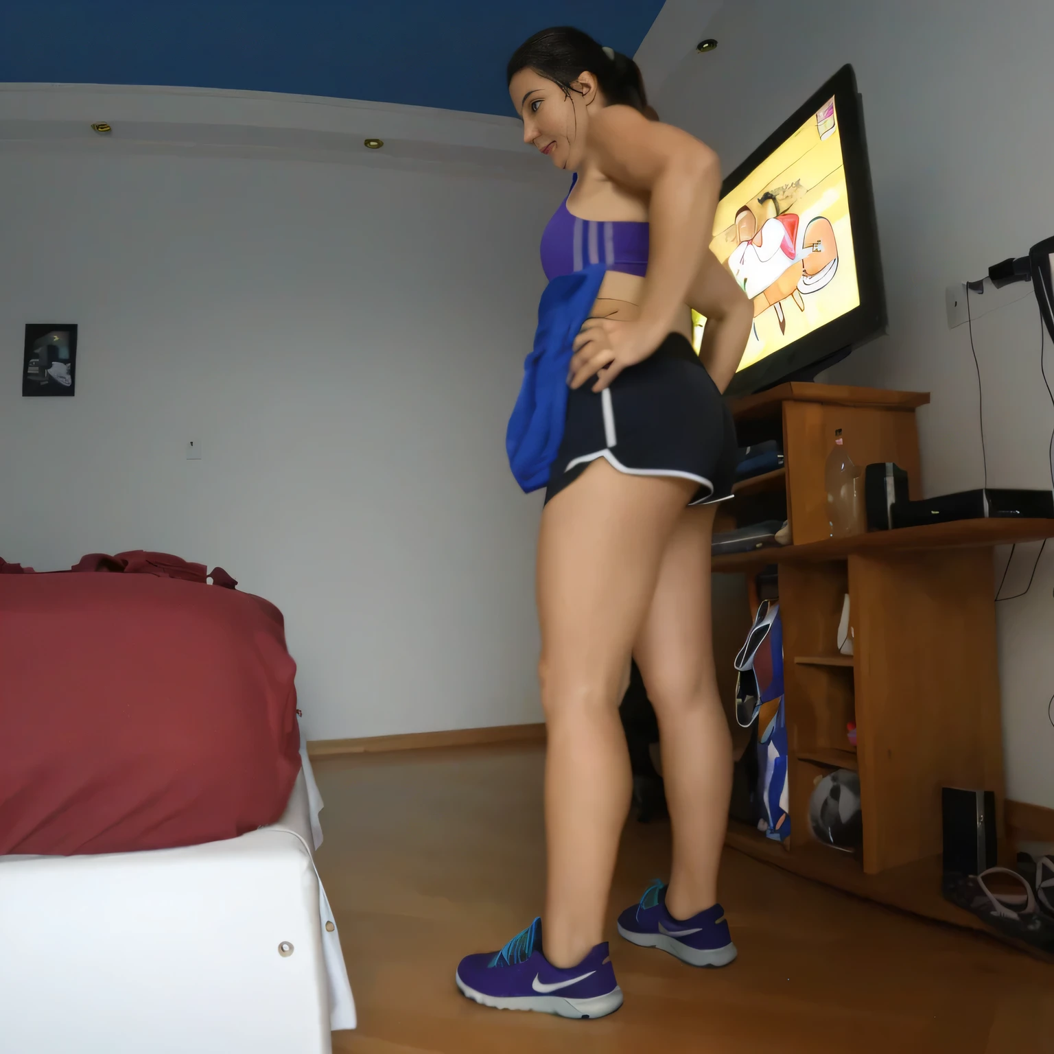 RAW, Best quality, high resolution, Masterpiece: 1.3, Beautiful brunette. Best quality, high resolution. Realistic, detailed, full-length woman in a blue top and black short shorts, very short woman in a blue top and black shorts is using an exercise bike, in shorts, legs and arms, long shot from back, sports bra and dark blue shorts, sports bra and shorts, shot from behind, working out, toned legs, thighs!!!!!!, A high resolution,(photographrealistic),Cute Girl,Sexy Pose, 8K, NFSW, A cute Brazilian woman, Smile, Underwear, opens legs,Tennis Uniforms, a miniskirt, Cowgirl, I'm sweating, Male genitals entering the crotch、fitness body, sports bra and dark blue shorts, toned legs. She is around 35 years old, a woman in good physical condition. Masterpiece, best quality, (best quality), realistic lighting, 8k.