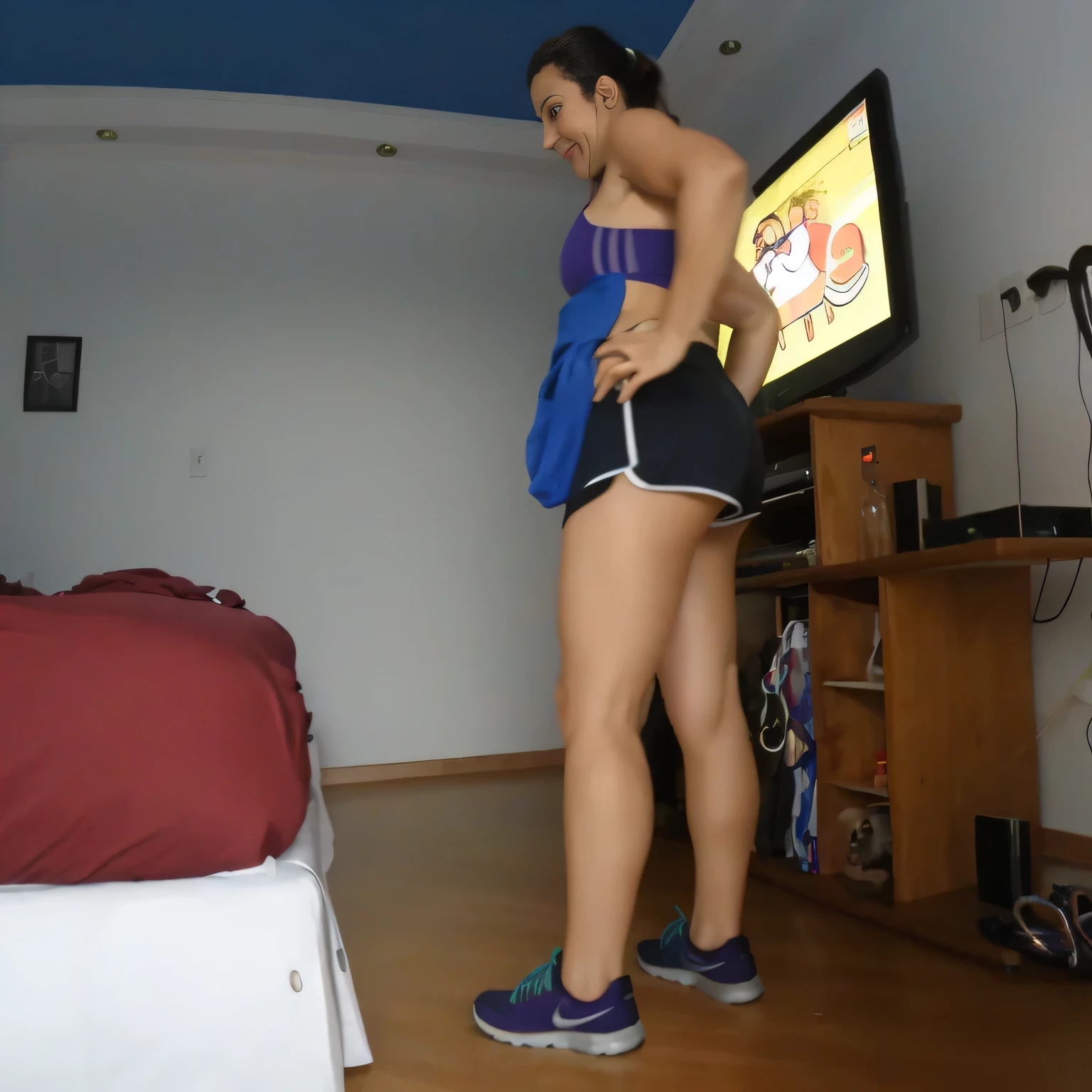 RAW, Best quality, high resolution, Masterpiece: 1.3, Beautiful brunette. Best quality, high resolution. Realistic, detailed, full-length woman in a blue top and black short shorts, very short woman in a blue top and black shorts is using an exercise bike, in shorts, legs and arms, long shot from back, sports bra and dark blue shorts, sports bra and shorts, shot from behind, working out, toned legs, thighs!!!!!!, A high resolution,(photographrealistic),Cute Girl,Sexy Pose, 8K, NFSW, A cute Brazilian woman, Smile, Underwear, opens legs,Tennis Uniforms, a miniskirt, Cowgirl, I'm sweating, Male genitals entering the crotch、fitness body, sports bra and dark blue shorts, toned legs. She is around 35 years old, a woman in good physical condition. Masterpiece, best quality, (best quality), realistic lighting, 8k.