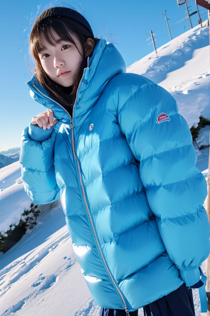 ultra realistic, 16K UHD photo of an 18-year-old Japanese age girl, wearing a very puffy shiny light blue down puffer jacket, high collar fully zipped up, atop a snow mountain in winter time, snow everywhere, heavy snow falling, realistic lighting, highest quality, masterpiece, perfect figure, big eyes,