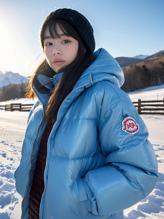 ultra realistic, 16K UHD photo of a 20-year-old Japanese girl, wearing a glossy Moncler Bady light blue puffer down jacket (jacket has shiny finish), high collar fully zipped up, in a winter snowstorm, snow everywhere, heavy snow falling, ice crystals on jacket, misty, soft diffused lighting, cold tones, highest quality, masterpiece, perfect figure, big eyes, natural scenery in background