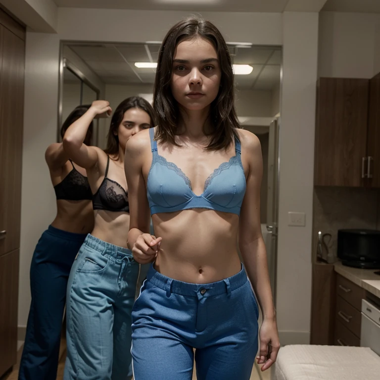 Dafne Keen dressed in a bra and blue pants