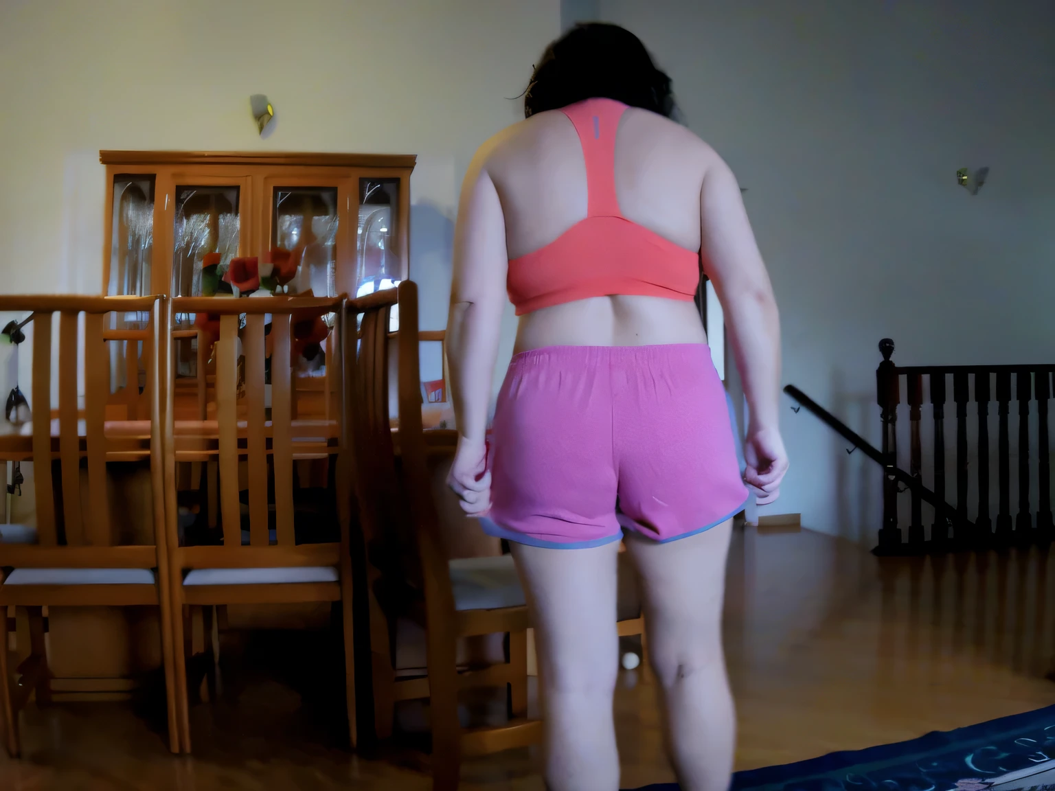 woman in pink shorts in a room, very short pink shorts, in shorts, short pink shorts, short shorts, pink shorts and pink short t-shirt, sexy girl wearing shorts, shot from behind, close-up from behind, rear-shot, shot from behind, medium shot taken from behind, shorts cut down, rear view. Best quality, high resolution. Realistic, detailed, full body woman in pink tank top and pink short shorts, with pink tank top and pink shorts, toned legs, thighs!!!!!!, A high resolution, (photographically realistic), Beautiful girl, Sexy Pose, 8K , NFSW. Masterpiece, best quality, (best quality), realistic lighting, 8k. Pink roses are in the foreground of a garden. Best quality, high resolution, Masterpiece: 1.3, A high resolution, (photographically realistic). She is around 35 years old, a woman in good physical condition.