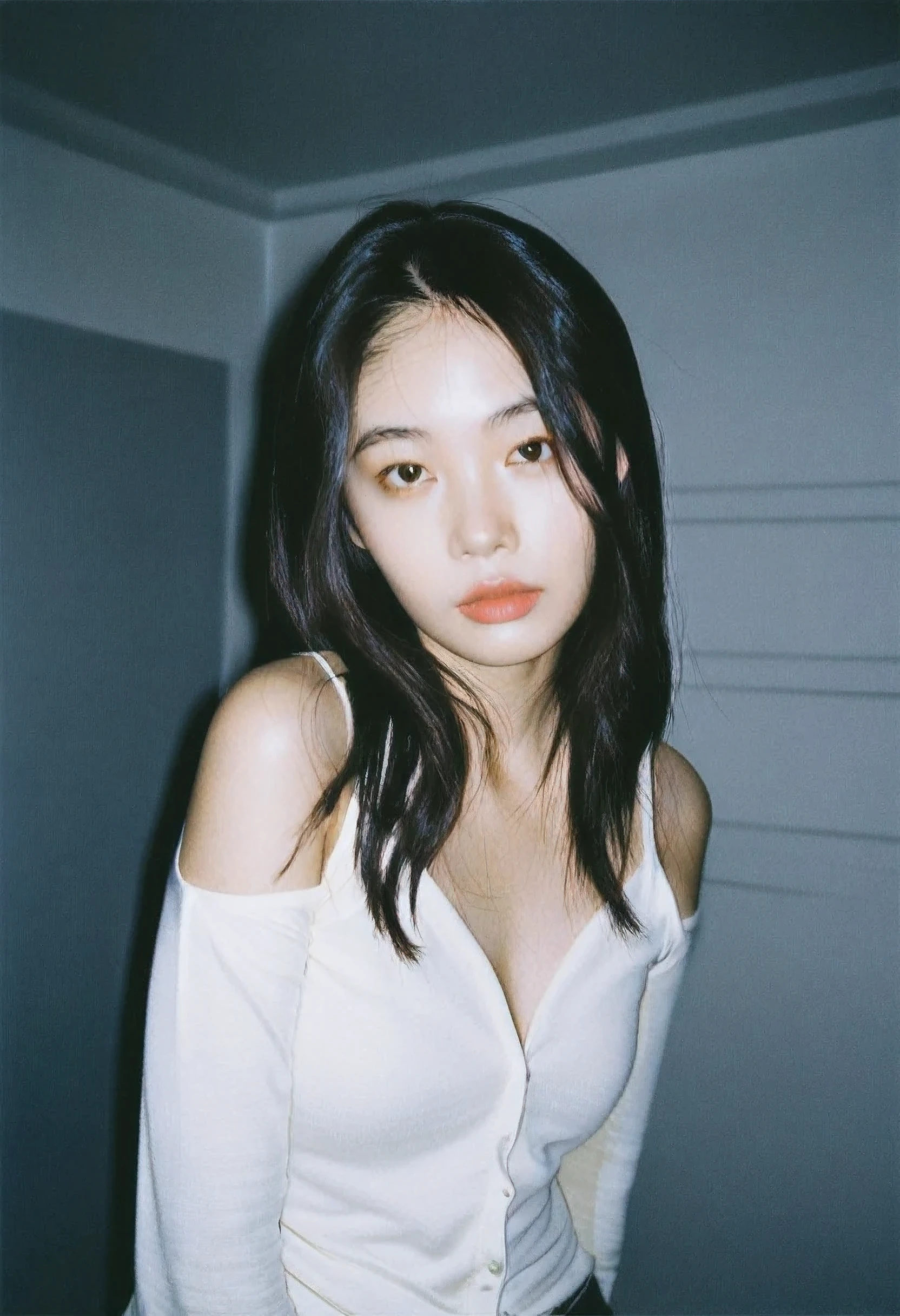  thai girl , 18-21 years old , White shirt, unbuttoned, open at the shoulders. , black hair , high-quality photo portrait , shot on a Polaroid camera , double eyelid --ar 34:65 --style raw