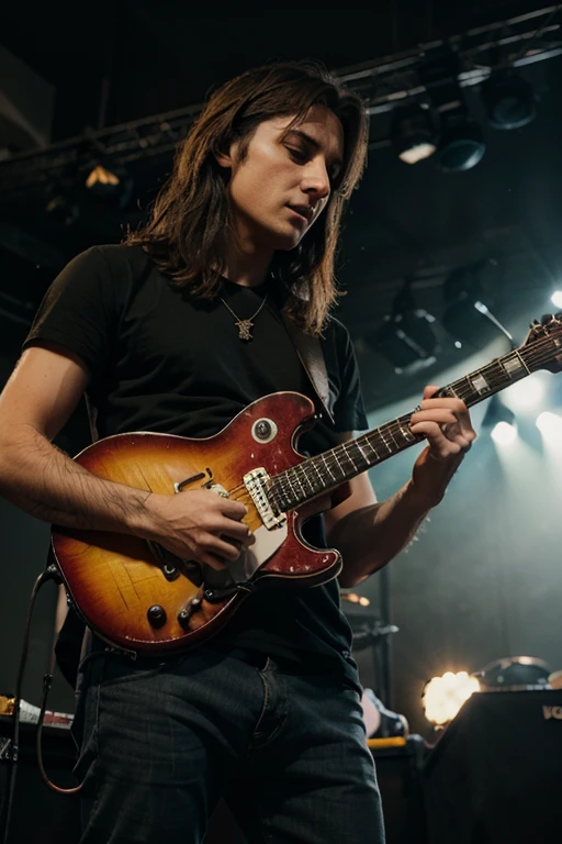 guitarist plays at a rock concert