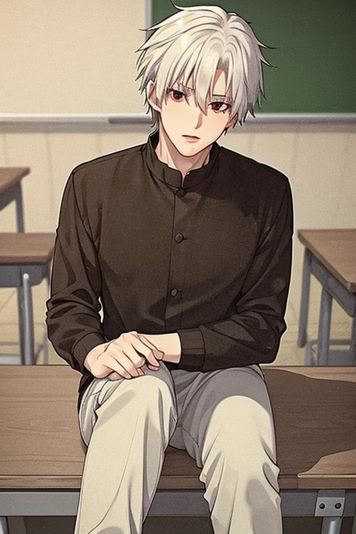 A young white haired handsome man with red eyes in a magic uniform is sitting on a desk in a classroom