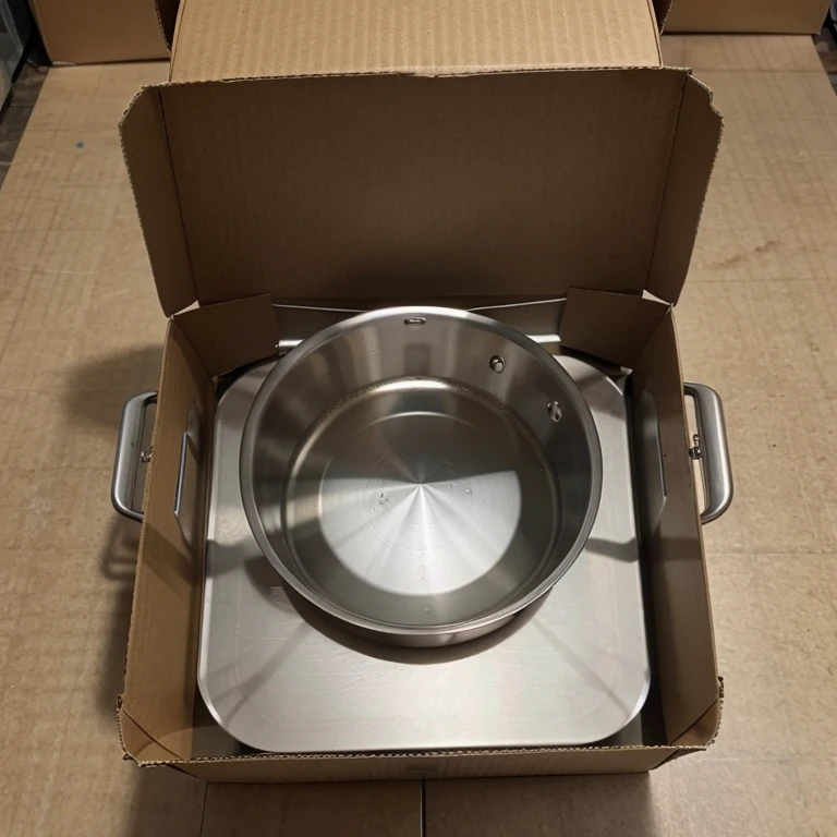 Stainless Frying pan inside the cardboard box 