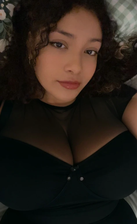 there is a woman laying in bed with a cell phone, taken in the early 2020s, profile image, around 1 9 years old, selfie of a young woman, 18 years old, alanis guillen, headshot profile picture, profile pic, 30 years old woman, 3 0 years old woman, her face framed with curls, Big tits, huge tits, no clothes, sexy, cute, minimal clothes, thick, bbw, chubby stomach, thick nipples, nipple piercings, large areola, hard nipples, piercing through shirt, nipples hard through shirt, busty, major cleavage, naked, ripping through top, spilling over sides, bra too tight, giant , extra wide hips, upper body zoom in, showing off huge , fat stomach, see through top, fat bbw, large areola showing, major cleavage, latina, down to stomach, wide hips, sexy, upper body zoom, thick arm, showing off , top half only, showing only upper, only a bra, showing off cleavage