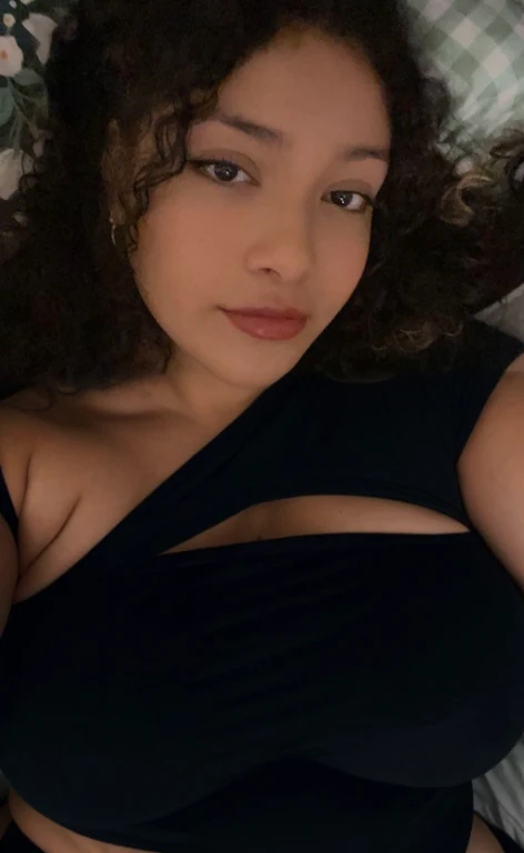 there is a woman laying in bed with a cell phone, taken in the early 2020s, profile image, around 1 , selfie of a young woman, 18 years old, alanis guillen, headshot profile picture, profile pic, 30 years old woman, 3 0 years old woman, her face framed with curls, Big tits, huge tits, no clothes, sexy, cute, minimal clothes, thick, bbw, chubby stomach, thick nipples, nipple piercings, large areola, hard nipples, piercing through shirt, nipples hard through shirt, busty, major cleavage, naked, ripping through top, spilling over sides, bra too tight, giant , extra wide hips, upper body zoom in, showing off huge , fat stomach, see through top, fat bbw, large areola showing, major cleavage, latina, down to stomach, wide hips, sexy, upper body zoom, thick arm, showing off , top half only, showing only upper, only a bra, showing off cleavage