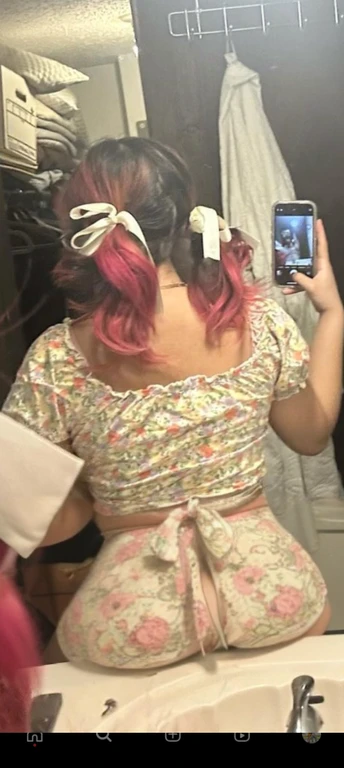 woman with pink hair taking a picture of herself in the mirror, wearing pink hair bow, pigtails, colorful pigtail, wearing underwear, with pink hair, wearing pink panties, back of the hair, roses in her hair, pink hair covered with hairpins, view from the back, curvy and bow, shot from the back, thick bow, insanely inflated hips, beautiful girl, big ass, huge ass, bbw, from behind, thick, thick thighs, wide hips, bbw, big , sideboob, giant ass, side view, big butt, round butt, tight underwear, underwear halfway off, underwear taking off, grabbing ass, ass spilling over underwear, too thick for clothes, side angle, chubby stomach, big , filipina, fat ass on sink