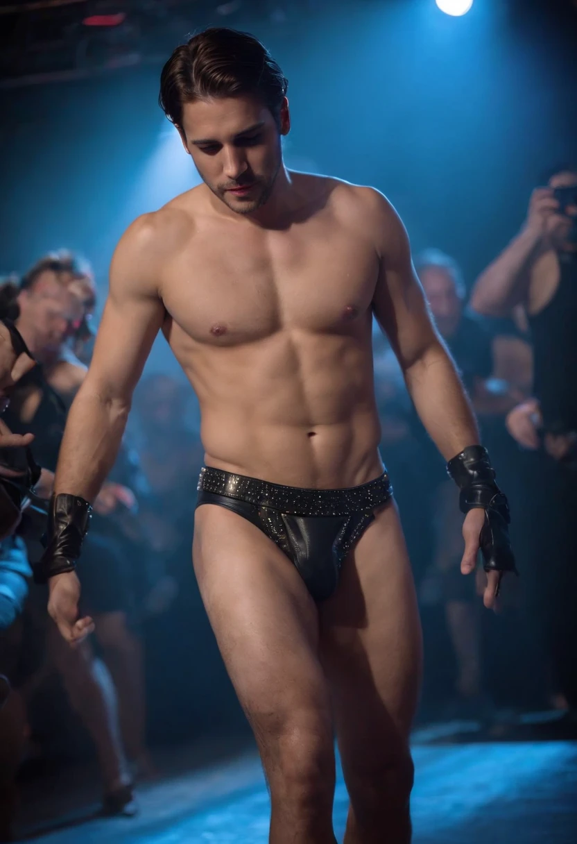 Very handsome 30-year-old man dances suggestively and erotically on a stage of a gay nightclub, practically naked he wears a blue and black thong with holes, and a fetish leather harness, large bulging crotch, he is all wet. Her hair is very short, wavy, brunette, with a ring in one ear.
