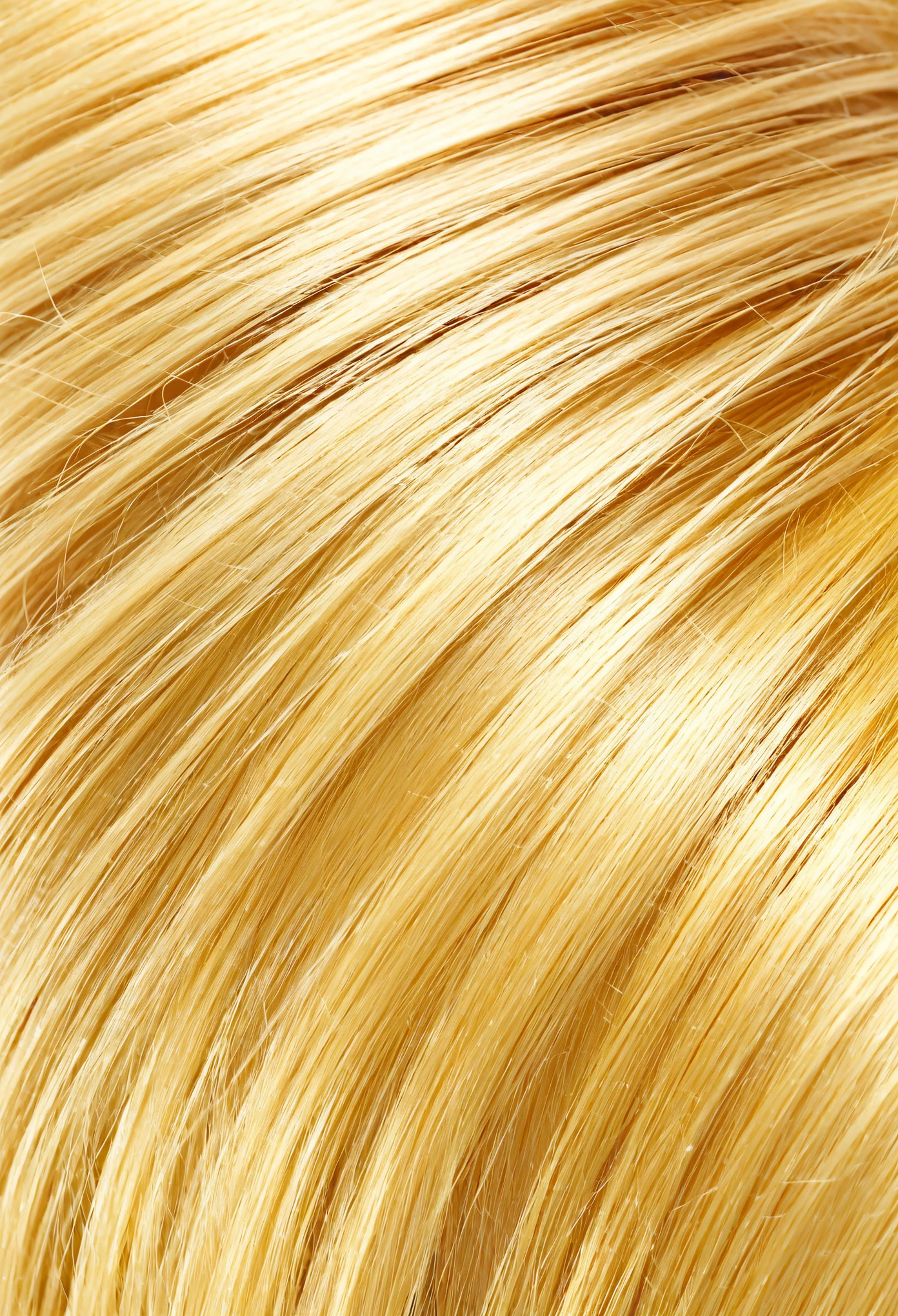 A blonde person is someone with hair that ranges in color from light gold to deep yellow., often with warm tones.