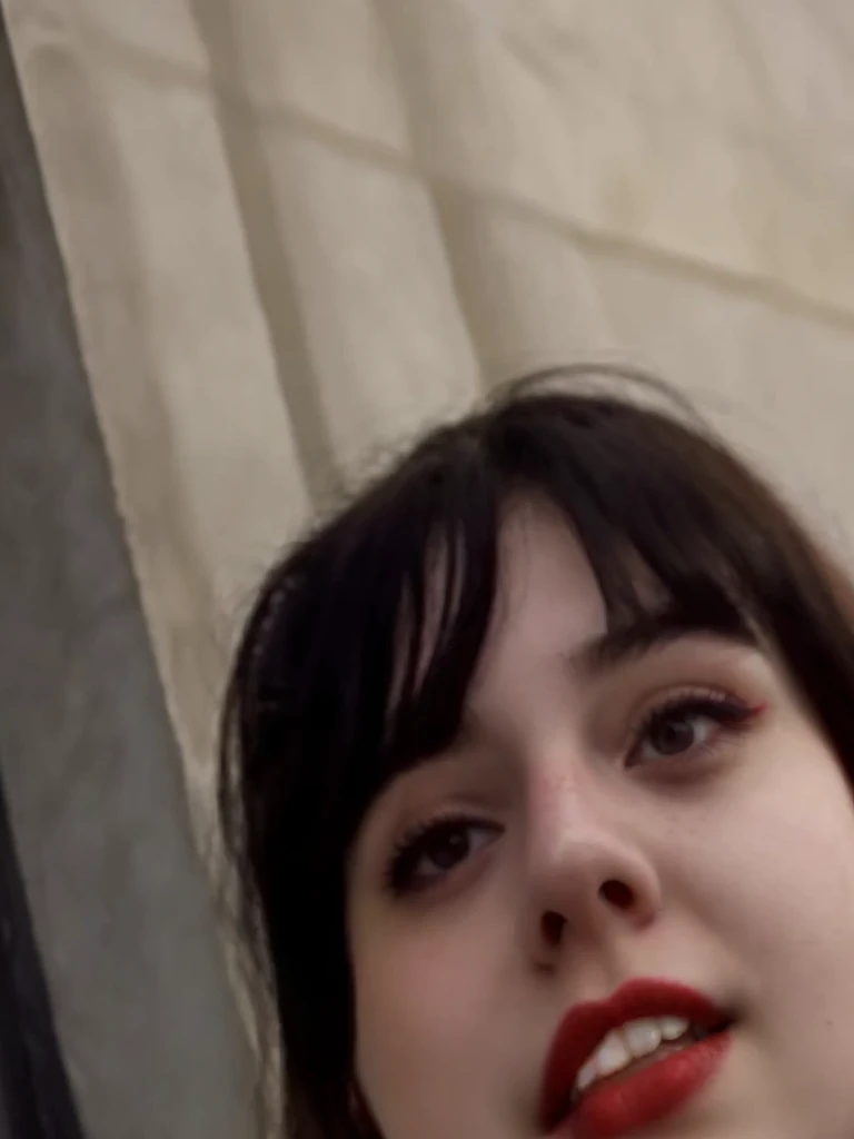 A beautiful girl. Make up pale skin, red lips