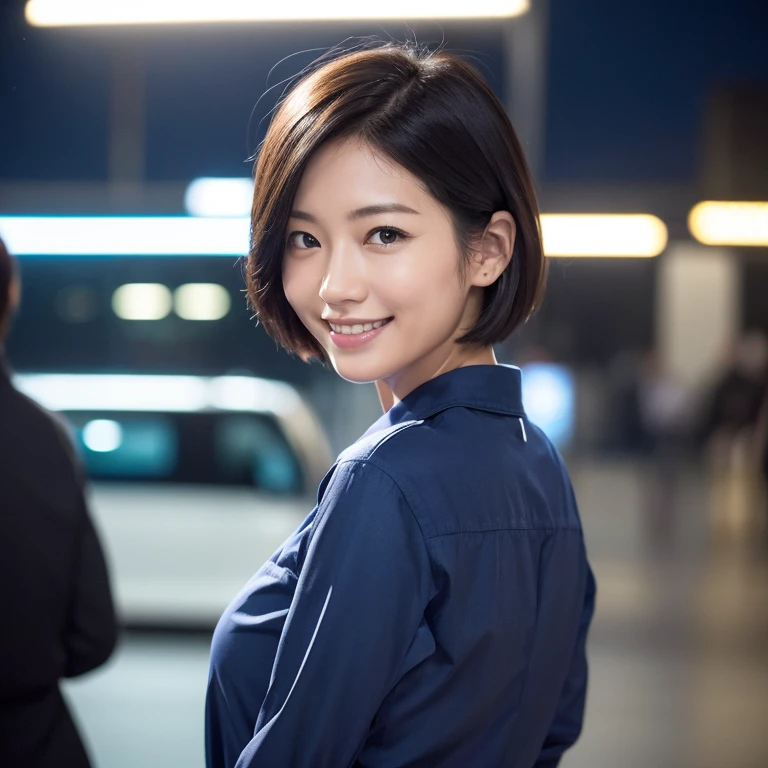 The face of a beautiful Japanese woman in her thirties with short hair, wearing a dark blue long-sleeved cotton shirt, looking back at me with a gentle smile. Focal length 100mmf/2.8, spring night, in front of the station at night, in front of the station with a lot of traffic at night, well-shaped face, great smile, toned body, dark blue long-sleeved cotton shirt, maximum close-up of eyes, sense of presence, 8K image quality ,Highest quality.