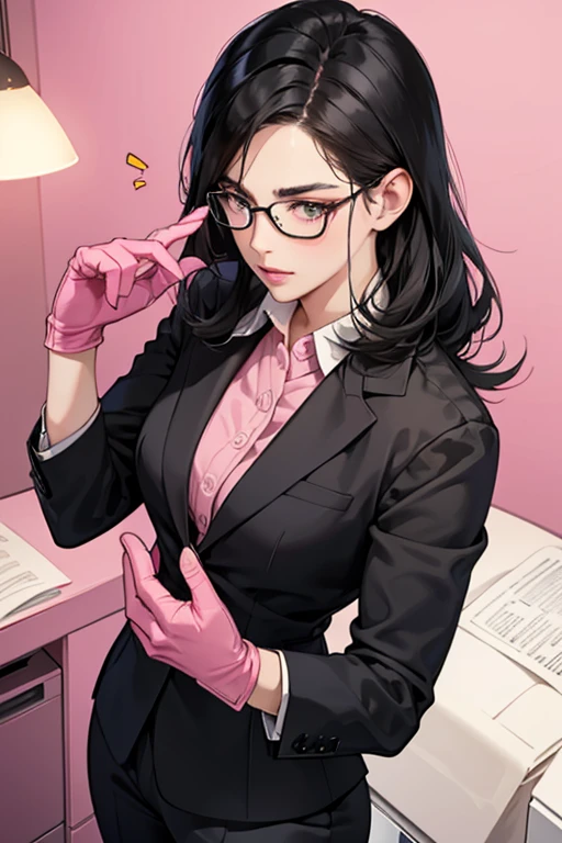 A black-haired, glasses-wearing mature woman in a suit stroking a man's penis with her hand in a pink long rubber glove in the office